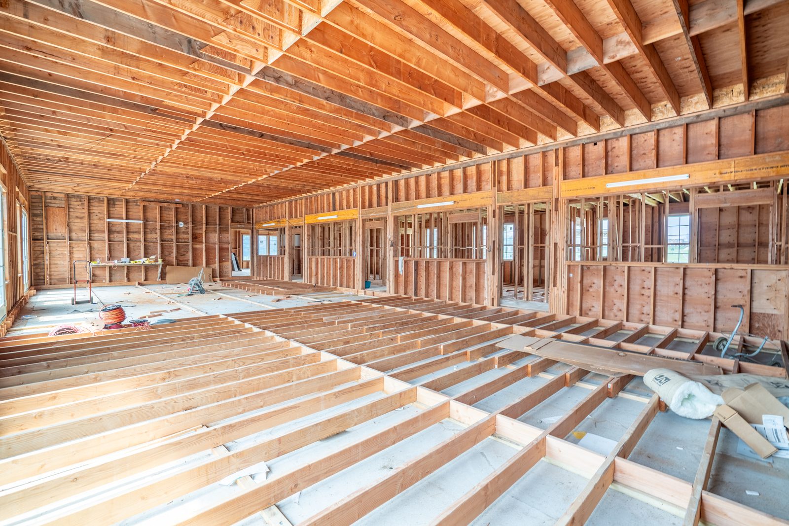 The living room space as it stands today — framed construction